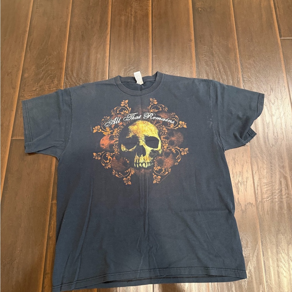 Vintage All That Remains Band Black Skull Graphic Tee with Orange-Yellow Accents